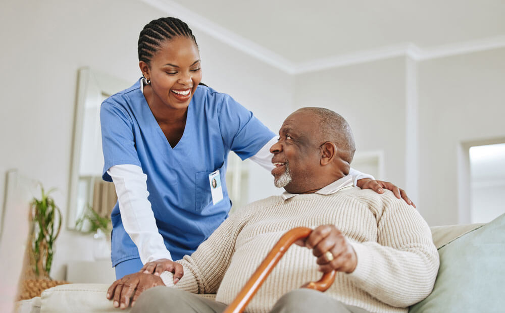 nurse and patient smiling