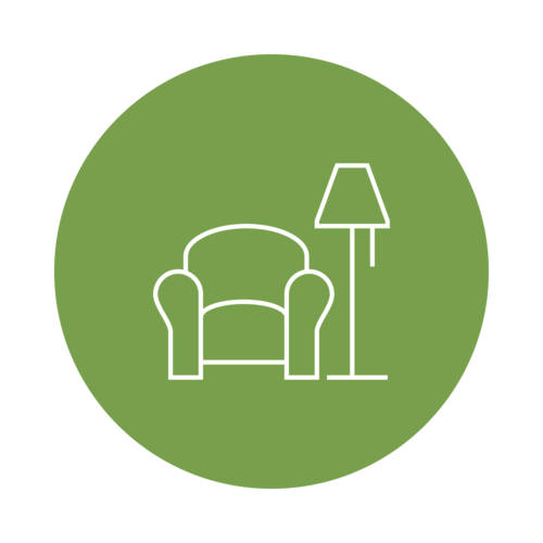 Green voans housing icon, a chair with a lamp next to it