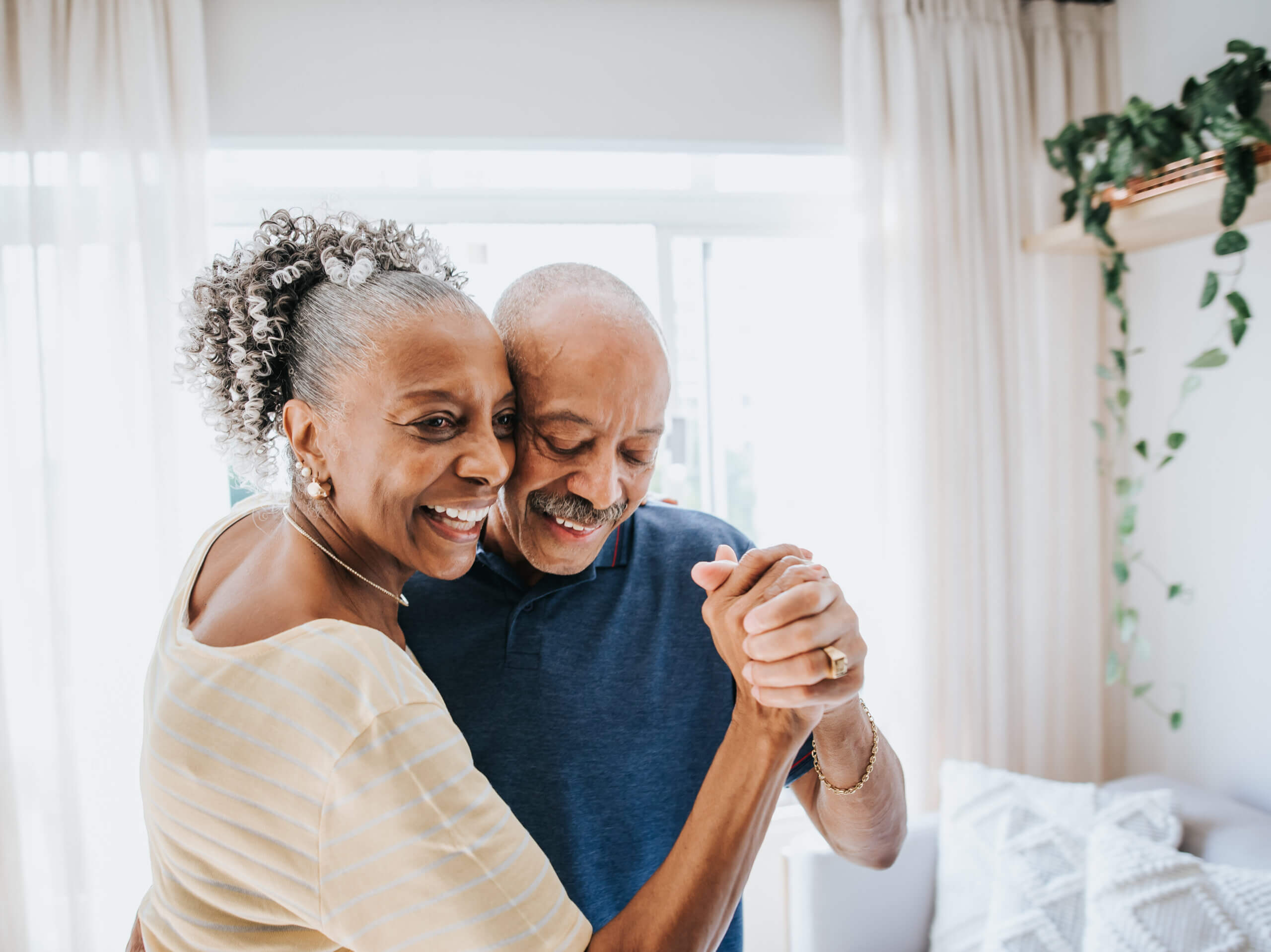 senior couple dancing together