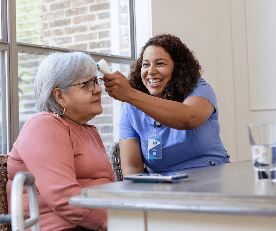 Home health aide providing services in the home.